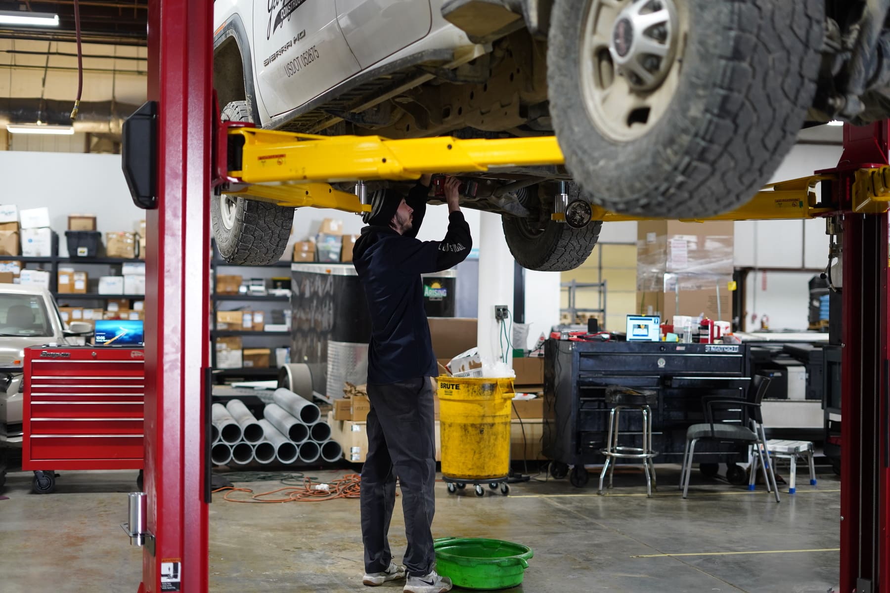 Commercial fleet vehicles lined up for scheduled oil change service